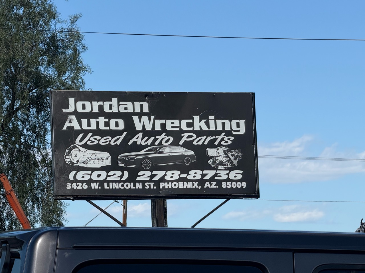 Jordan Auto Wrecking used auto parts sign, Phoenix, Arizona